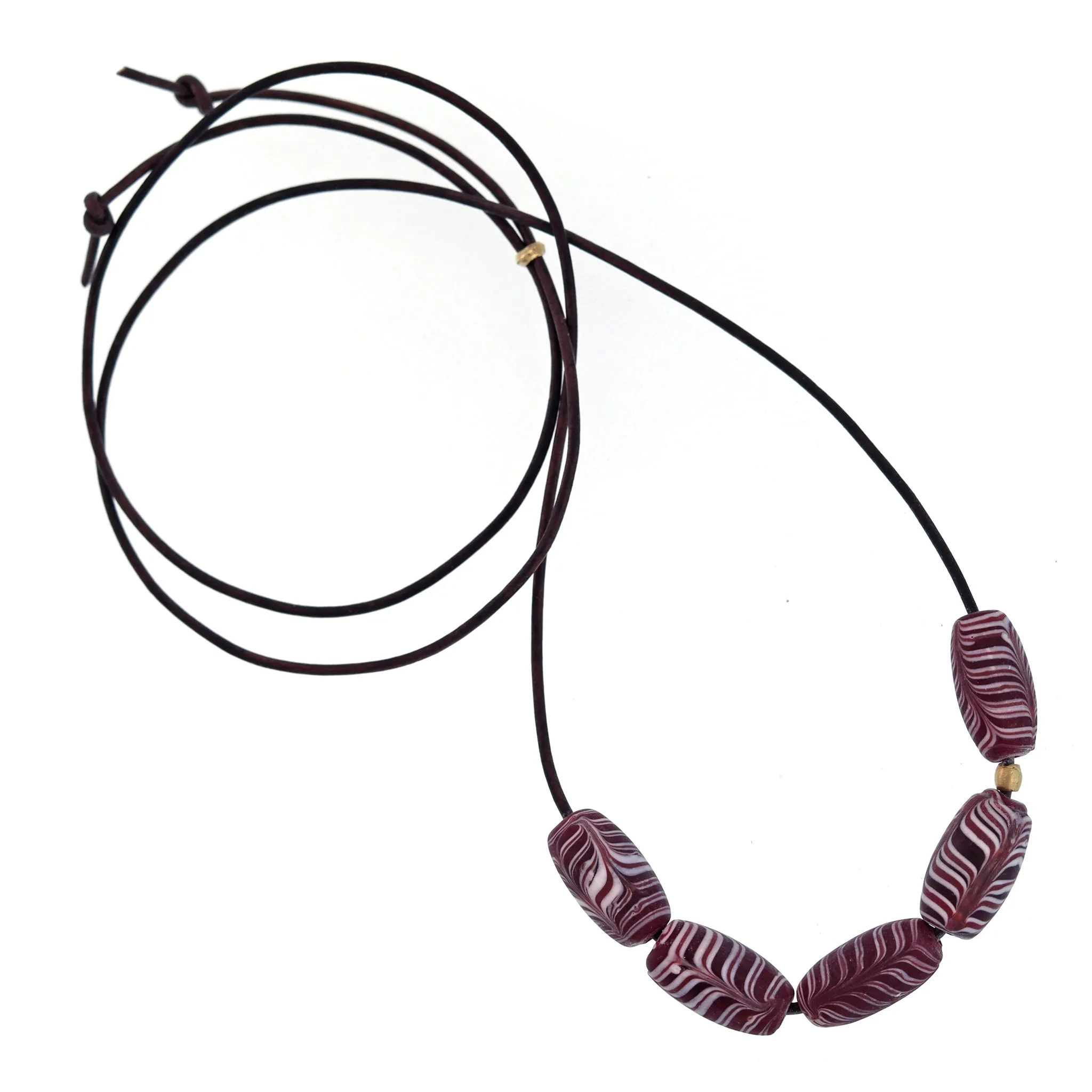 A Purple   White Swirled Glass Bead Necklace